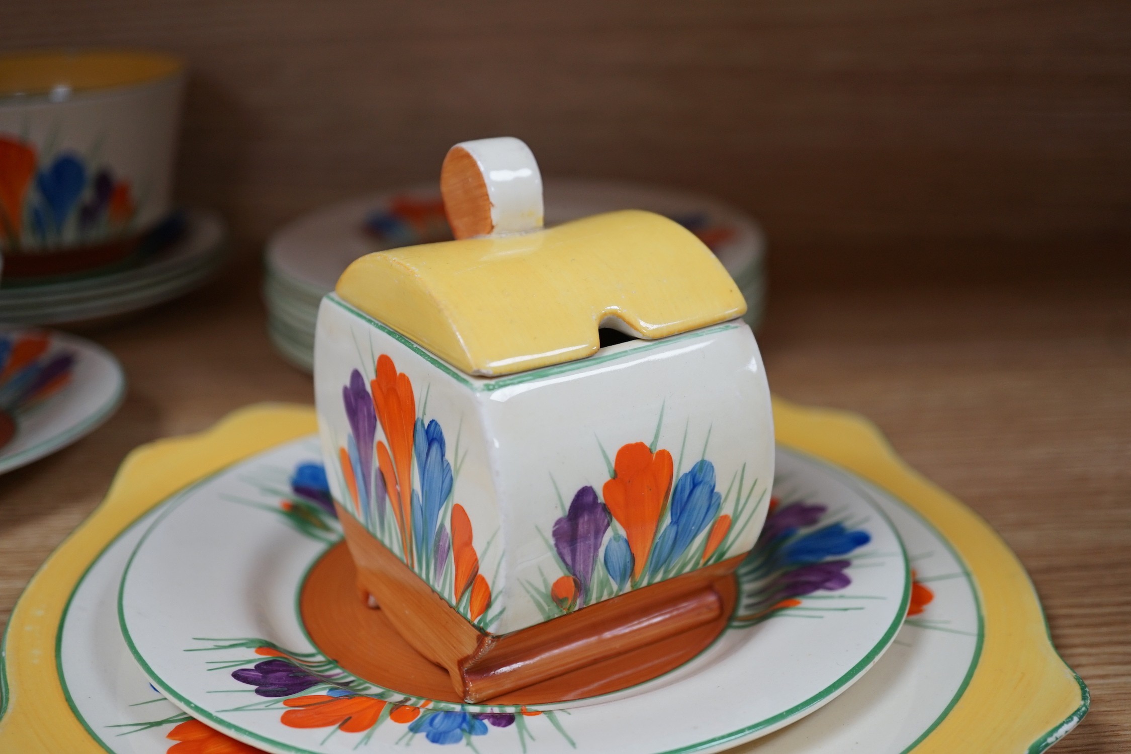A Clarice Cliff seventeen piece Autumn Crocus part teaset, including a preserve jar and cover